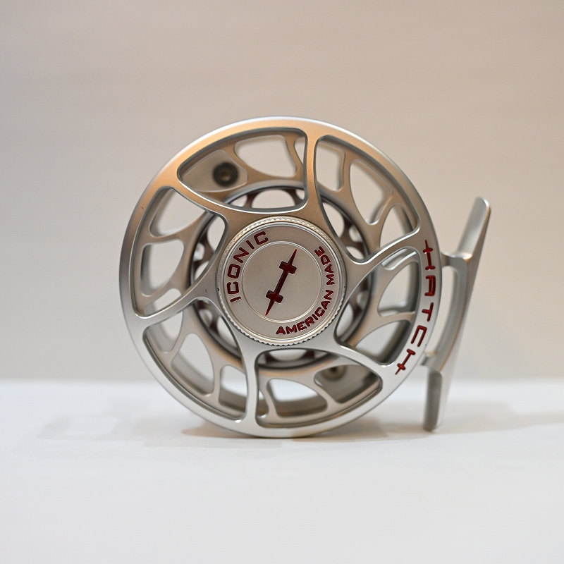 HATCH ICONIC 3 PLUS REEL LA - CLEAR/RED